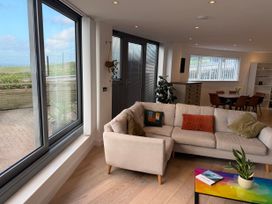 A living room with a sofa and a coffee table at Apartment 29 in Newquay