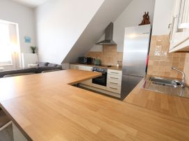 A kitchen with countertops and appliances at Chandlers Nook in Portland