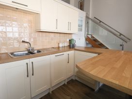 A kitchen with a sink and countertop at Chandlers Nook in Portland