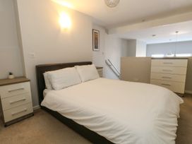 A bedroom with a bed and furniture at Chandlers Nook in Portland