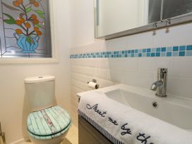 A bathroom with a sink and toilet at Chandlers Nook in Portland