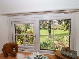 A window view with garden outside at The Annexe at Cherry Cottage Upton St Leonards