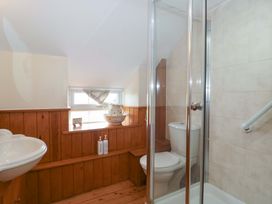 A bathroom with a sink and shower at The Annexe at Cherry Cottage Upton St Leonards