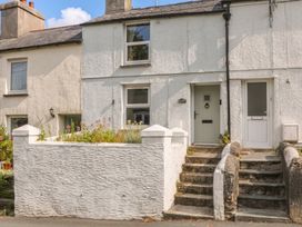 A house exterior with front door and steps at Bedford Cottage in Yelverton