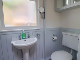 A bathroom with a sink and toilet at Salt & Stone in Lyme Regis
