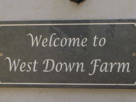 A welcome sign for West Down Farm in South Molton