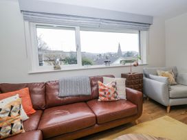 A living room with a sofa and window at Ambwray in Ambleside