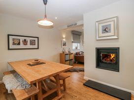 A dining room with a table and chairs at Ambwray in Ambleside