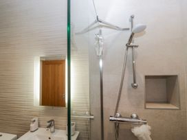 A bathroom with shower and sink at Ambwray in Ambleside