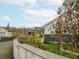 An outdoor view of plants and buildings at Ambwray in Ambleside