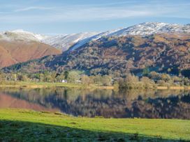 A landscape featuring mountains and a lake at Ambwray in Ambleside