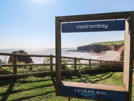A view of Ladram Bay with cliffs and ocean at Ladram Bay Otterton