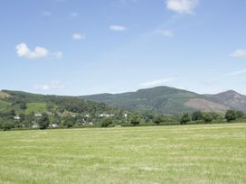A landscape with fields and mountains at Cottage 1 in Braithwaite