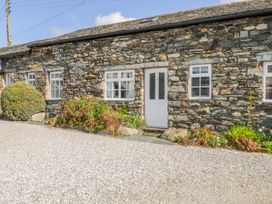 The exterior of a stone cottage at Cottage 2 in Keswick