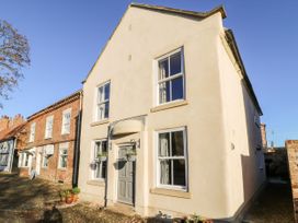 An exterior view of a house with windows and a door at The Old Post Office in York