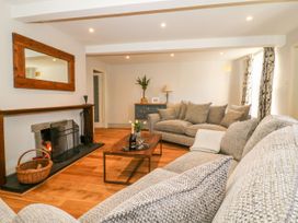 A living room with a sofa and coffee table at The Old Post Office, York