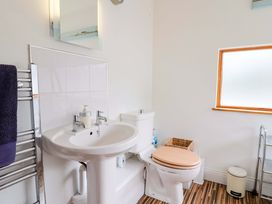 A bathroom with a sink and toilet at 4 Peaslands Road Sidmouth