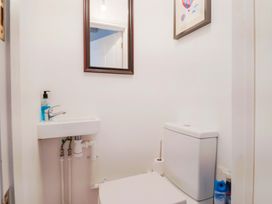 A bathroom with a sink and a toilet at 4 Peaslands Road Sidmouth