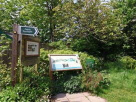 A public footpath sign and information board at 4 Peaslands Road Sidmouth