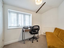 An office with a desk and chair at Seaside Cottage Escape in Paignton