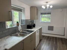 A kitchen with countertop and appliances at Llangollen - House - Sleeps 8- Garden in Llangollen