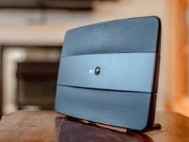 A BT router on a wooden table