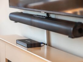 A living room with a television and soundbar at Luxury 2 Bed Room Lake View Apt Bowness Parking Bowness-On-Windermere