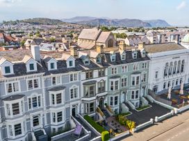 A view of houses and a walkway at Sea View, East Parade Llandudno