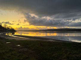 A landscape view of water reflecting the sky at Flat 2, Dorstan in Arnside