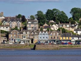 A view of buildings along a shoreline at Flat 2, Dorstan in Arnside
