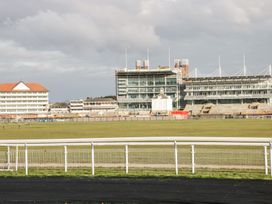 A racetrack with grandstands at Blacksmiths Retreat York