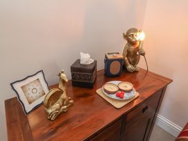 A table with decorative items and snacks at Masons Place in Whitby