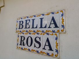 A tile sign displaying the name Bella Rosa