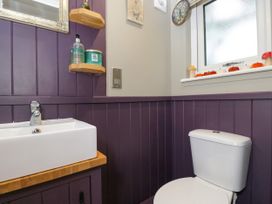 A bathroom with sink and toilet at Valley View Shepherd's Hut South Molton