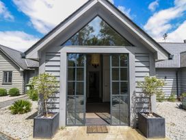 An entrance with plants on either side at Wood Meadow in Helston
