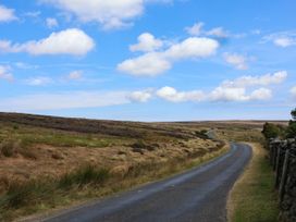 A winding road through a field at Swallow Cottage in Lealholm
