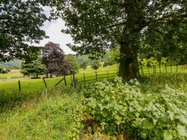 A rural landscape with trees and a field at Bobbin Nook