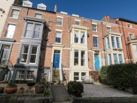 A building exterior with stairs and windows at Cuckoo's Nest in Whitby