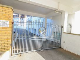 An entrance gate to a parking area at Flat 17 Golden Gates in Poole