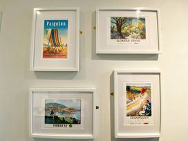 Framed posters of Paignton, Glorious Devon, Torquay, and Teignmouth at 2B Redcliffe in Torquay