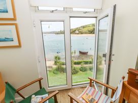 A room with a view overlooking water at 24 The Salcombe Salcombe