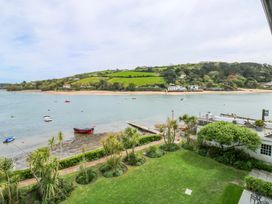 A view of the water with boats and beach from 24 The Salcombe in Salcombe