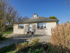 A house with windows and a door at Linden Lea in Grange-Over-Sands