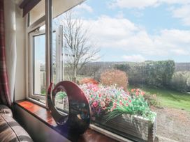 A living room window with flower planter at Linden Lea Field Broughton near Cartmel