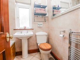 A bathroom with a sink and toilet at Linden Lea Field Broughton near Cartmel