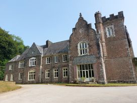A historic building with multiple windows at Lukesland Wing near Ivybridge