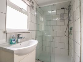 A bathroom with a sink and shower at 130 Park Ave Holiday Village