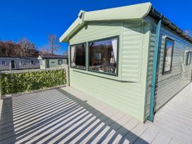 An outdoor deck area of a mobile home at 75 Morpeth Mews Wooler