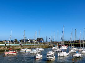 A marina with boats in the water at Sunnyside in River Chapel