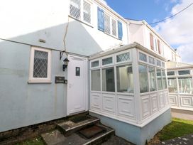 An entrance with steps and a conservatory at The Woolpack in Tenby